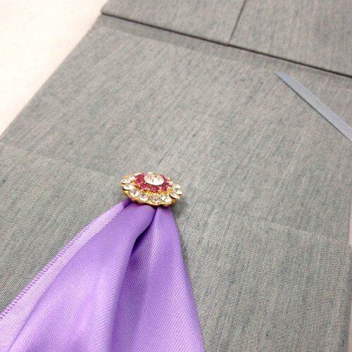 Silver Silk Folio Invitation with Gleaming Gold-Plated Brooch Accent